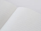 Open GRAPHILO A5 notebook showing smooth 8 mm ruled fountain pen paper