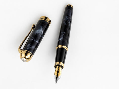 Close-up of the Hero Doctor 14K gold fountain pen nib and feed