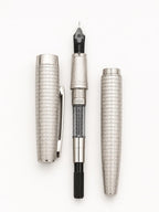 Close-up of the Hongdian Galaxy 14K gold fountain pen nib and feed