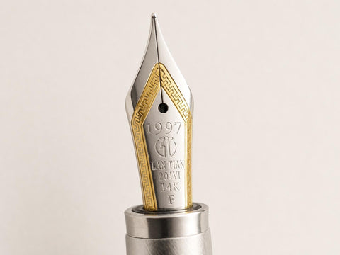 Engraved sterling silver barrel and cap detail on the Hongdian Galaxy fountain pen